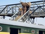 A paramilitary soldier stands guard at a railway station in the Sibi district of southwestern Balochistan province during a security operation against militants a day after they hijacked a passenger train. A paramilitary soldier stands guard at a railway station in the Sibi district of southwestern Balochistan province during a security operation against militants a day after they hijacked a passenger train.