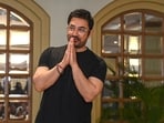 Aamir Khan posed for the media but Gauri avoided cameras.