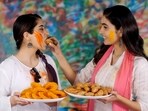 Teeth can get affected from excess of sweets and drinks on Holi. Teeth can get affected from excess of sweets and drinks on Holi.