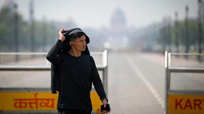 A youth covers his head on a hot day at India Gate in New Delhi. (Sanchit Khanna/ HT Photo) A youth covers his head on a hot day at India Gate in New Delhi. (Sanchit Khanna/ HT Photo)