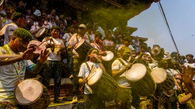In Nepal, festivities have already begun with people in Kathmandu playing traditional instruments to mark the joyous event. (Niranjan Shrestha/AP) In Nepal, festivities have already begun with people in Kathmandu playing traditional instruments to mark the joyous event. (Niranjan Shrestha/AP)