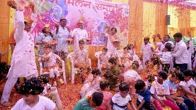 In Prayagraj, Uttar Pradesh, children with cerebral palsy participated in Phulon Ki Holi celebrations as well (Holi of Flowers). (PTI) In Prayagraj, Uttar Pradesh, children with cerebral palsy participated in Phulon Ki Holi celebrations as well (Holi of Flowers). (PTI)