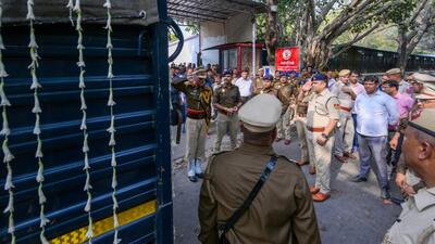 Police officers pay their respects to the mortal remains of ASI Singh. (RAJ K RAJ /HT PHOTO) Police officers pay their respects to the mortal remains of ASI Singh. (RAJ K RAJ /HT PHOTO)