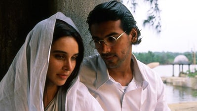 John Abraham with Lisa Ray in Water. John Abraham with Lisa Ray in Water.