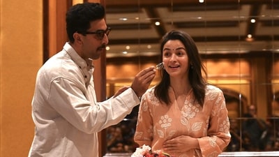 Ranbir Kapoor and Alia Bhatt at latter's birthday celebration with the media (AFP) Ranbir Kapoor and Alia Bhatt at latter's birthday celebration with the media (AFP)
