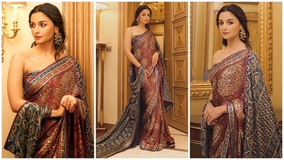 To attend the 2024 Joy Awards, Alia - styled by Rhea Kapoor - picked an Ajrak saree designed by ace couturiers Abu Jani Sandeep Khosla. She paired the pre-draped sequinned ensemble with a complementing Ajrak drape and a strapless blouse. Statement chandbalis, smokey eyes, brown lips, feathered brows, flushed cheeks, and mascara-adorned lashes rounded off the glam. &nbsp; (Instagram)