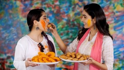 Teeth can get affected from excess of sweets and drinks on Holi. (Shutterstock) Teeth can get affected from excess of sweets and drinks on Holi. (Shutterstock)