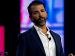 Donald Trump Jr. is indifferent about ex-wife Vanessa Trump's new relationship with Tiger Woods, confirming he is 'cool' with it.