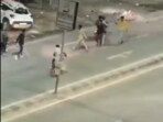 A video shot by an eyewitness showed a mob of 20 men attacking an SUV owner and damaging other vehicles in the vicinity using swords and sticks. A video shot by an eyewitness showed a mob of 20 men attacking an SUV owner and damaging other vehicles in the vicinity using swords and sticks.