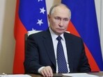 In this pool photograph distributed by Russian state agency Sputnik, Russia's President Vladimir Putin attends a meeting In this pool photograph distributed by Russian state agency Sputnik, Russia's President Vladimir Putin attends a meeting