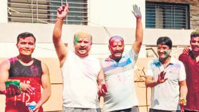 Damania photos of judge playing holi with cops stirs the Beed plot Damania photos of judge playing holi with cops stirs the Beed plot