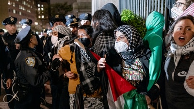 Demonstrators hold their ground near a main gate at Columbia University in New York, Tuesday, April 30, 2024, as New York City police officers move to clear the area after a building was taken over by pro-Palestinian protesters earlier in the day. (AP Photo/Craig Ruttle, File) (AP) Demonstrators hold their ground near a main gate at Columbia University in New York, Tuesday, April 30, 2024, as New York City police officers move to clear the area after a building was taken over by pro-Palestinian protesters earlier in the day. (AP Photo/Craig Ruttle, File) (AP)