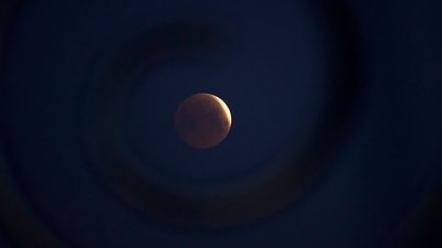 A rare 'blood moon' total lunar eclipse is captured near totality from the village of Donon, 40 km from Pontevedra, in northwestern Spain, early on March 14, 2025. This type of eclipse happens when Earth blocks the light from the sun that normally illuminates the moon, resulting in it appearing deep red, as if it were covered in blood. In Spain, totality occurred at 8:25 am. (AFP) A rare 'blood moon' total lunar eclipse is captured near totality from the village of Donon, 40 km from Pontevedra, in northwestern Spain, early on March 14, 2025. This type of eclipse happens when Earth blocks the light from the sun that normally illuminates the moon, resulting in it appearing deep red, as if it were covered in blood. In Spain, totality occurred at 8:25 am. (AFP)
