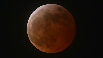 A lunar eclipse is seen during the Blood Moon Lunar Eclipse above Los Angeles, California, on March 13, 2025. (Photo by Frederic J. Brown / AFP) (AFP) A lunar eclipse is seen during the Blood Moon Lunar Eclipse above Los Angeles, California, on March 13, 2025. (Photo by Frederic J. Brown / AFP) (AFP)