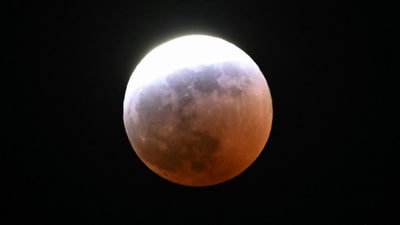 A partial lunar eclipse is seen during the Blood Moon Lunar Eclipse above Palm Springs, California, on March 13, 2025. (AFP) A partial lunar eclipse is seen during the Blood Moon Lunar Eclipse above Palm Springs, California, on March 13, 2025. (AFP)