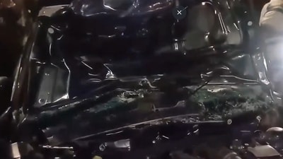 The speeding car took a sharp turn near Amrapali Complex and then crashed into a bike. (X/@ANI) The speeding car took a sharp turn near Amrapali Complex and then crashed into a bike. (X/@ANI)