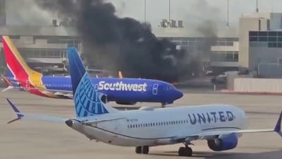 Passengers were forced to evacuate onto the wing as flames and thick smoke. (@allenanalysis/X) Passengers were forced to evacuate onto the wing as flames and thick smoke. (@allenanalysis/X)