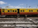 Soldiers board a relief train headed to Bolan, where a passenger train was attacked by separatist militants, at a railway station in Mach, Balochistan, Pakistan.
