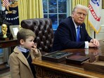 U.S. President Donald Trump looks on as X Æ A-12, Elon Musk's son, stands beside him in the Oval Office of the White House in Washington, D.C., U.S., February 11, 2025.   REUTERS/Kevin Lamarque     TPX IMAGES OF THE DAY