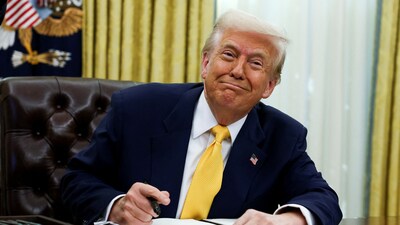 US President Donald Trump signs an executive order in the Oval Office of the White House in Washington, D.C. on March 7, 2025. (Reuters)