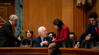 Senator John Cornyn, a Republican from Texas, center left, and Senator Maria Cantwell, a Democrat from Washington, center right, during a Senate Finance Committee confirmation hearing in Washington, DC, US, on Friday, March 14, 2025. (Bloomberg) Senator John Cornyn, a Republican from Texas, center left, and Senator Maria Cantwell, a Democrat from Washington, center right, during a Senate Finance Committee confirmation hearing in Washington, DC, US, on Friday, March 14, 2025. (Bloomberg)