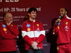 Ferrari team principal Frederic Vasseur with drivers Charles Leclerc and Lewis Hamilton.