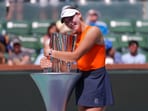 Mirra Andreeva, of Russia, poses with the winner's trophy at the BNP Paribas Open tennis tournament Sunday, March 16, 2025, in Indian Wells, Calif. (AP Photo/Mark J. Terrill) Mirra Andreeva, of Russia, poses with the winner's trophy at the BNP Paribas Open tennis tournament Sunday, March 16, 2025, in Indian Wells, Calif. (AP Photo/Mark J. Terrill)