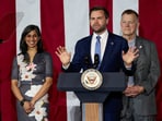 U.S. Vice President JD Vance delivers remarks as second lady Usha Vance and Vantage Plastics CEO Paul Aultman listen in Bay City, Michigan, U.S., March 14, 2025.     REUTERS/Rebecca Cook