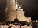 A ship fires missiles at an undisclosed location, after President Donald Trump launched military strikes against Yemen's Iran-aligned Houthis on Saturday.