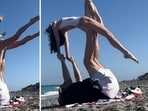 Jordon Hudson posts pics of Bill Belichick helping her with acrobatics shortly after slamming critic over age gap remark (jordon_isabella/Instagram)