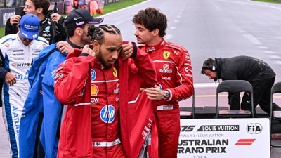 Ferrari's British driver Lewis Hamilton (C), Ferrari's Monegasque driver Charles Leclerc (R)and other drivers leave after posing for a group photo. (AFP) Ferrari's British driver Lewis Hamilton (C), Ferrari's Monegasque driver Charles Leclerc (R)and other drivers leave after posing for a group photo. (AFP)