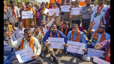BJP workers protest against the Punjab government in Amritsar on Sunday. (PTI)