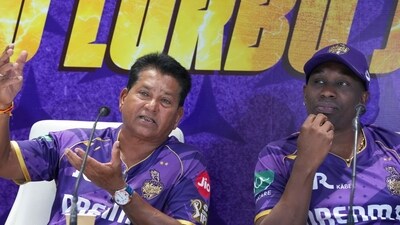 KKR have two contrasting personalities in the coaching staff - head coach Chandrakant Pandit and mentor Dwayne Bravo. (PTI) KKR have two contrasting personalities in the coaching staff - head coach Chandrakant Pandit and mentor Dwayne Bravo. (PTI)