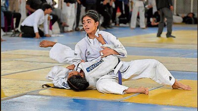 Players in action during the 45th junior state judo championship in Ludhiana on Sunday. (Manish/HT) Players in action during the 45th junior state judo championship in Ludhiana on Sunday. (Manish/HT)