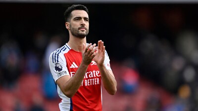 Arsenal's Mikel Merino celebrates after the match. (REUTERS)