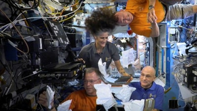 NASA astronauts Sunita Williams, Nick Hague, Barry Wilmore, and Donald Pettit unbox Thanksgiving meals, from the International Space Station (ISS), in this screen grab taken from a handout video, released on November 26, 2024. (NASA/Handout via REUTERS    THIS IMAGE HAS BEEN SUPPLIED BY A THIRD PARTY/File Photo) (via REUTERS)