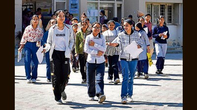Students coming out of an examination centre in Ludhiana on Sunday. (Manish/HT)