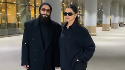 Deepika Padukone and Ranveer Singh pose for paparazzi at the airport. Deepika Padukone and Ranveer Singh pose for paparazzi at the airport.