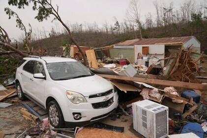 A vehicle sits in front of a damaged home and debris from a severe storm Saturday, March 15, 2025, in Wayne County, Mo.AP/PTI(AP03_16_2025_000035B) (AP) A vehicle sits in front of a damaged home and debris from a severe storm Saturday, March 15, 2025, in Wayne County, Mo.AP/PTI(AP03_16_2025_000035B) (AP)