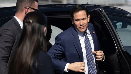 US Secretary of State Marco Rubio disembarks from his vehicle as he walks to board his airplane prior to departing Quebec City Jean Lesage International Airport in Quebec, Canada, Friday, March 14, 2025. (AP)