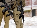 Israeli soldiers stand guard at the Hermon ski resort, bordering Syria and Lebanon, during a media tour organised by the spokesman of the Israeli army, in the Israeli-annexed Golan Heights on January 8, 2025. After the fall of Syria's president Bashar al-Assad, Israel occupied strategic positions in a UN-patrolled buffer zone separating Syrian-controlled territory and the Israeli-annexed Golan Heights which Israel seized from Syria in the 1967 Arab-Israeli war and has occupied ever since. (Photo by Jalaa MAREY / AFP) Israeli soldiers stand guard at the Hermon ski resort, bordering Syria and Lebanon, during a media tour organised by the spokesman of the Israeli army, in the Israeli-annexed Golan Heights on January 8, 2025. After the fall of Syria's president Bashar al-Assad, Israel occupied strategic positions in a UN-patrolled buffer zone separating Syrian-controlled territory and the Israeli-annexed Golan Heights which Israel seized from Syria in the 1967 Arab-Israeli war and has occupied ever since. (Photo by Jalaa MAREY / AFP)