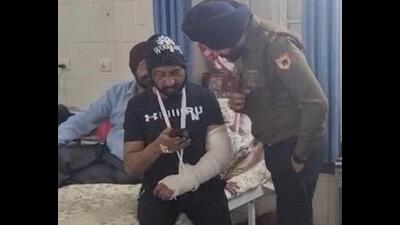 An army officer enquiring after the health of Colonel Pushpinder Bath at the Military Hospital in Patiala on Monday. The colonel suffered a fracture in the left arm in the March 13 assault. (HT Photo) An army officer enquiring after the health of Colonel Pushpinder Bath at the Military Hospital in Patiala on Monday. The colonel suffered a fracture in the left arm in the March 13 assault. (HT Photo)