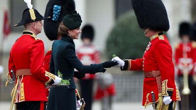 Britain's Catherine, Princess of Wales, presents a traditional sprig of shamrock to a guardsman during the St. Patrick's Day Parade at Wellington Barracks in London, Britain, March 17, 2025. REUTERS/Isabel Infantes (REUTERS)