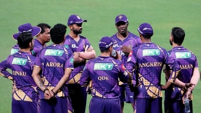 Kolkata Knight Riders (KKR) mentor Dwayne Bravo, centre, interacts with players during a training session ahead of the IPL 2025 tournament, at Eden Gardens in Kolkata, West Bengal, Saturday, March 15, 2025. (Swapan Mahapatra/PTI)