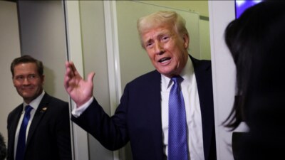 U.S. President Donald Trump speaks to reporters, watched by National Security Advisor Mike Waltz, aboard Air Force One on his return to Washington, D.C., U.S., March 16, 2025. (Reuters) U.S. President Donald Trump speaks to reporters, watched by National Security Advisor Mike Waltz, aboard Air Force One on his return to Washington, D.C., U.S., March 16, 2025. (Reuters)