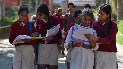 Students coming out of the examination centre after appearing for exam on Monday in Ludhiana. (Manish/Hindustan Times)
