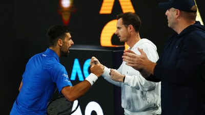 Serbia's Novak Djokovic celebrates with his coach Andy Murray after winning his quarter final match against Spain's Carlos Alcaraz. (REUTERS)