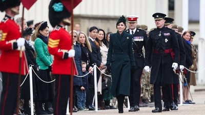 TOPSHOT - Britain's Catherine, Princess of Wales (C) arrives to attend St Patrick's Day Parade at Wellington Barracks, central London, on March 17, 2025. (Photo by Adrian DENNIS / AFP) (AFP)