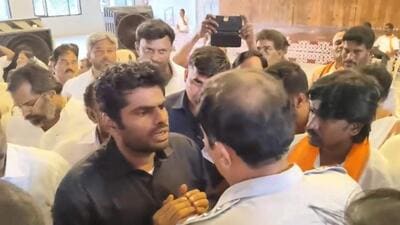 Tamil Nadu BJP chief K Annamalai argues with the police while being released on Monday. (PTI) Tamil Nadu BJP chief K Annamalai argues with the police while being released on Monday. (PTI)