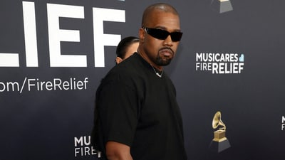 Facing cancellations and collapsing investments, Kanye West believes his future in North America is bleak. (Photo by Frazer Harrison / GETTY IMAGES NORTH AMERICA / Getty Images via AFP) Facing cancellations and collapsing investments, Kanye West believes his future in North America is bleak. (Photo by Frazer Harrison / GETTY IMAGES NORTH AMERICA / Getty Images via AFP)